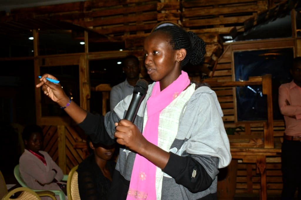 A student leader speaks at a YIM session